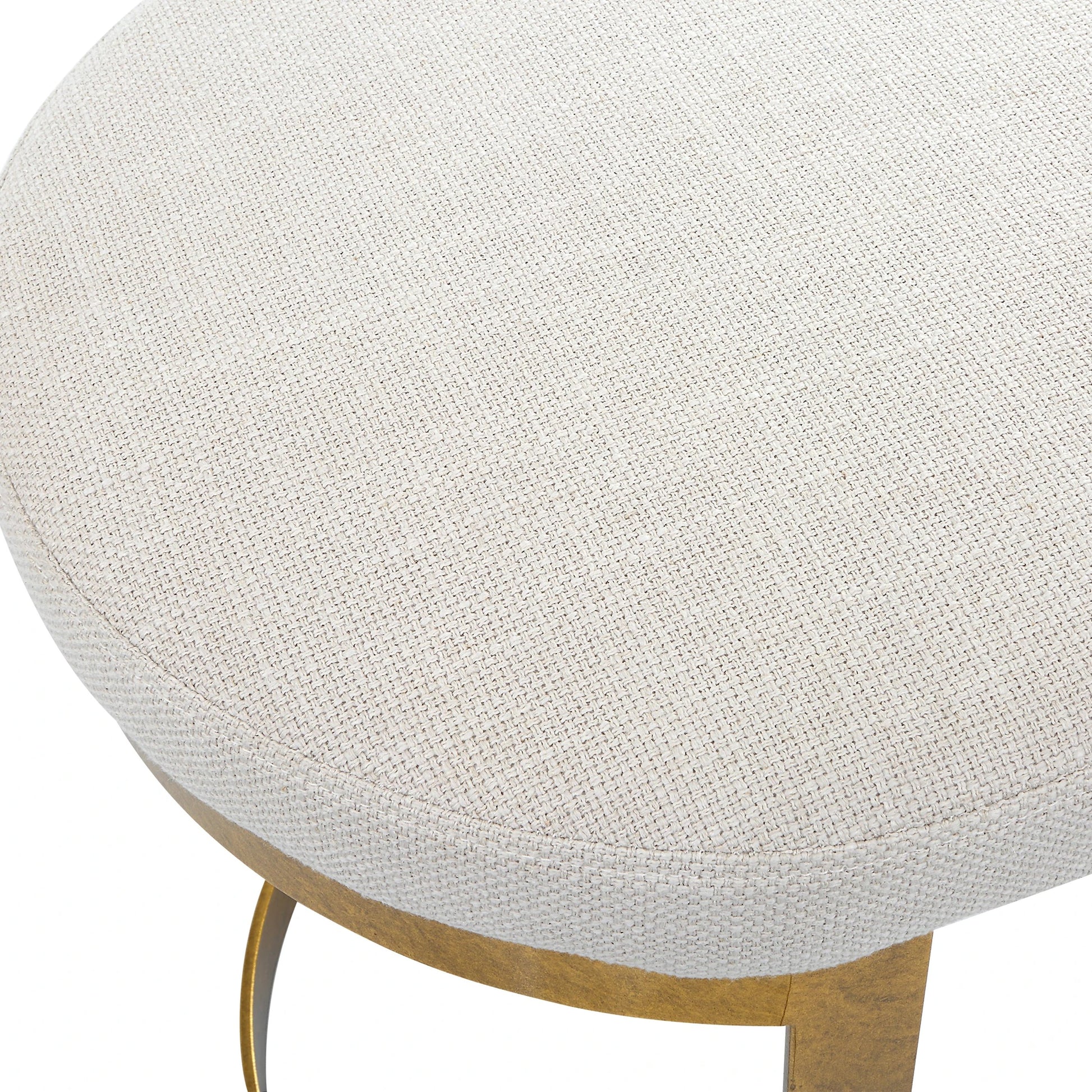 Infinity Accent Stool by Uttermost in gold. Made from metal, mdf, foam, fabric in a modern style.