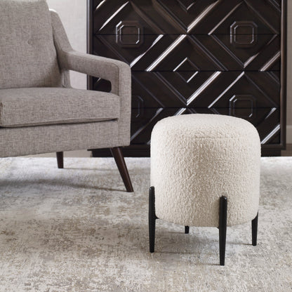Arles Ottoman by Uttermost in white and satin black. Made from hardwood, plywood, fabric, foam in a transitional style.