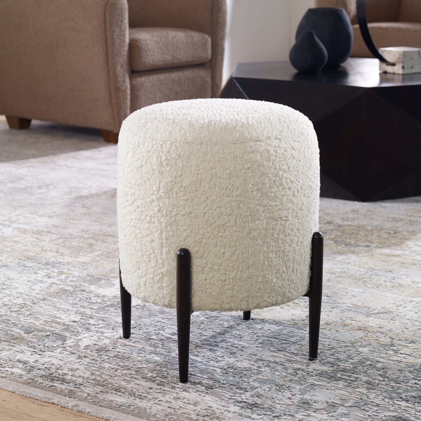 009 SI-1923692 | Lifestyle | Arles Ottoman by Uttermost in white and satin black. Made from hardwood, plywood, fabric, foam in a transitional style.