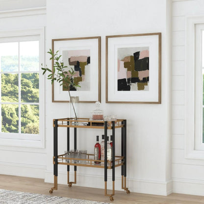 Kentmore Bar Cart by Uttermost in matte black, brushed gold. Made from iron, tempered glass in a modern style.