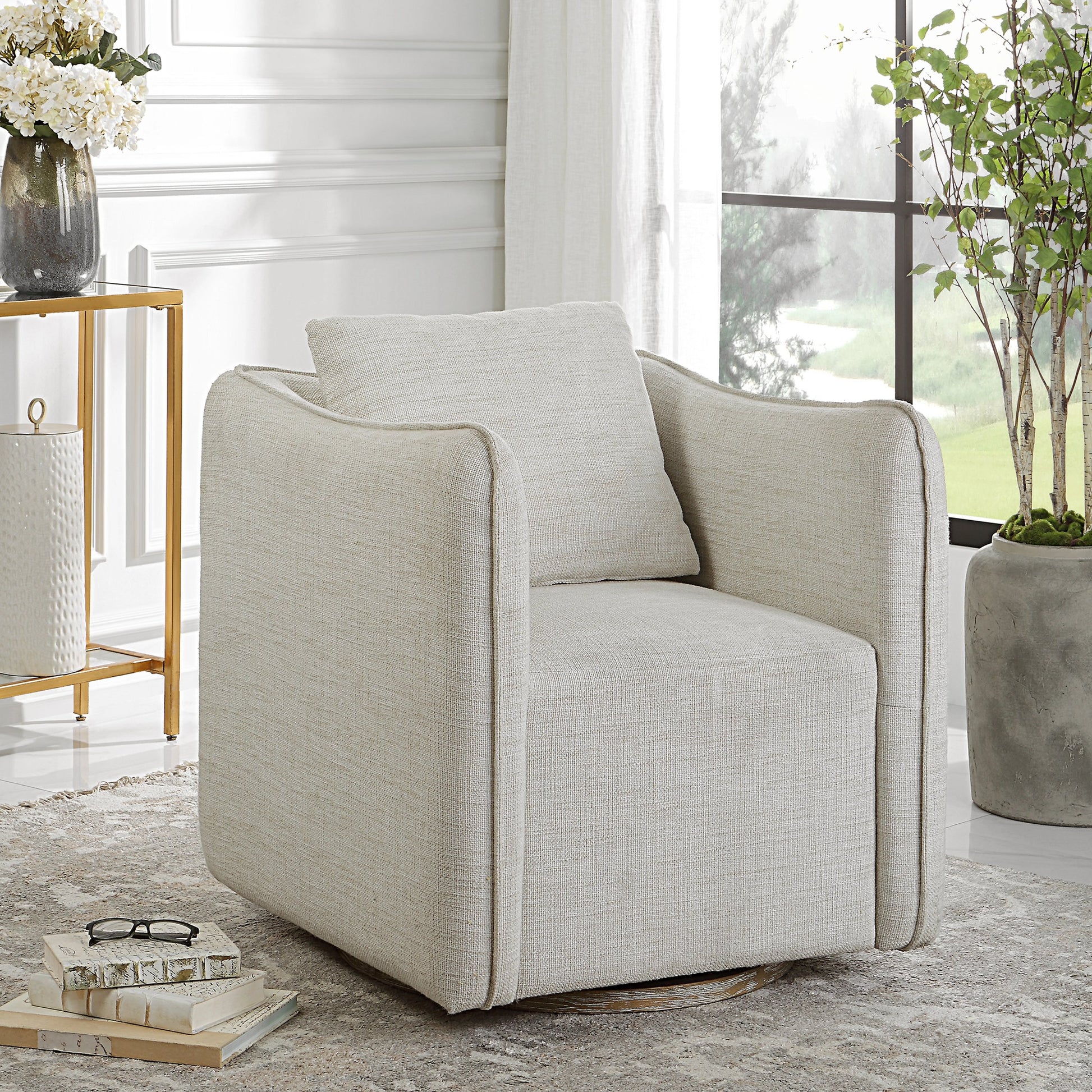 Corben Swivel Armchair by Uttermost in gray. Made from hardwood, plywood, fabric, foam in a modern style.