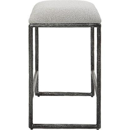 Brisbane Counter Stool by Uttermost in ivory, gray and charcoal. Made from cast iron, mdf, foam, fabric in a modern style.