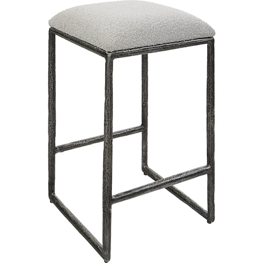 Brisbane Counter Stool by Uttermost in ivory, gray and charcoal. Made from cast iron, mdf, foam, fabric in a modern style.