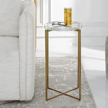 Star-Crossed Accent Table by Uttermost in gold. Made from seeded thick glass, stainless steel in a modern style.