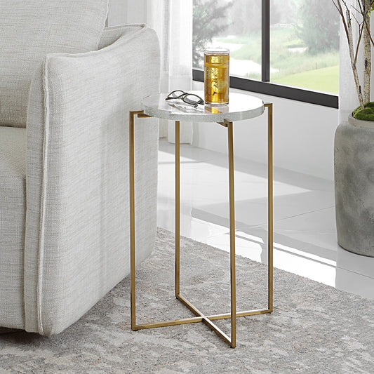Star-Crossed Accent Table by Uttermost in gold. Made from seeded thick glass, stainless steel in a modern style.