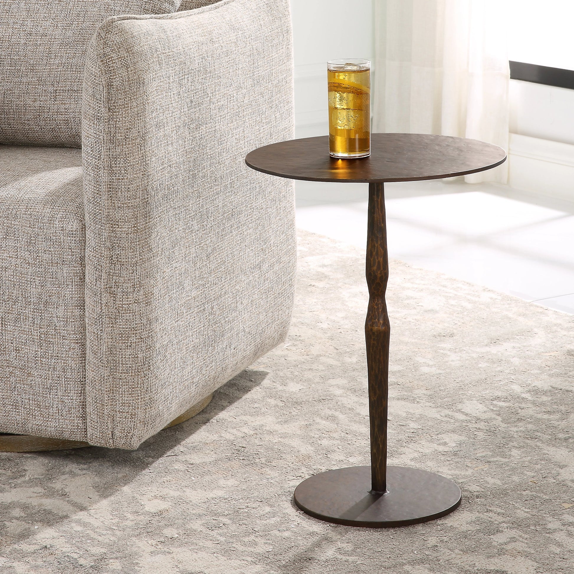 Industria Accent Table by Uttermost in bronze. Made from iron in a modern style.