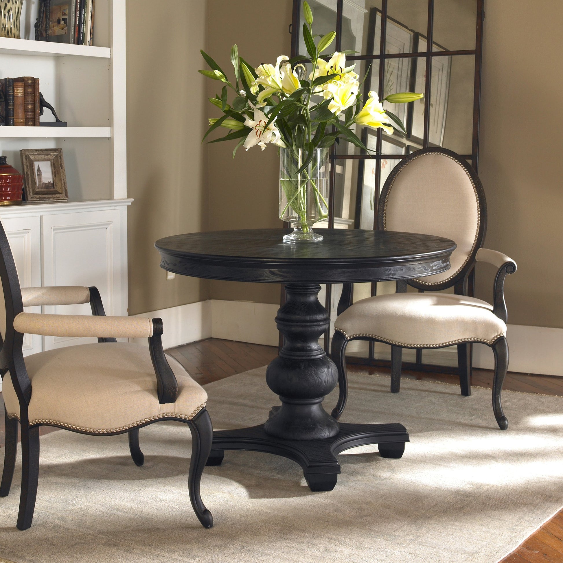 Brynmore Round Table by Uttermost. Made from wood, mdf, pu leather in a cottage & farmhouse style.