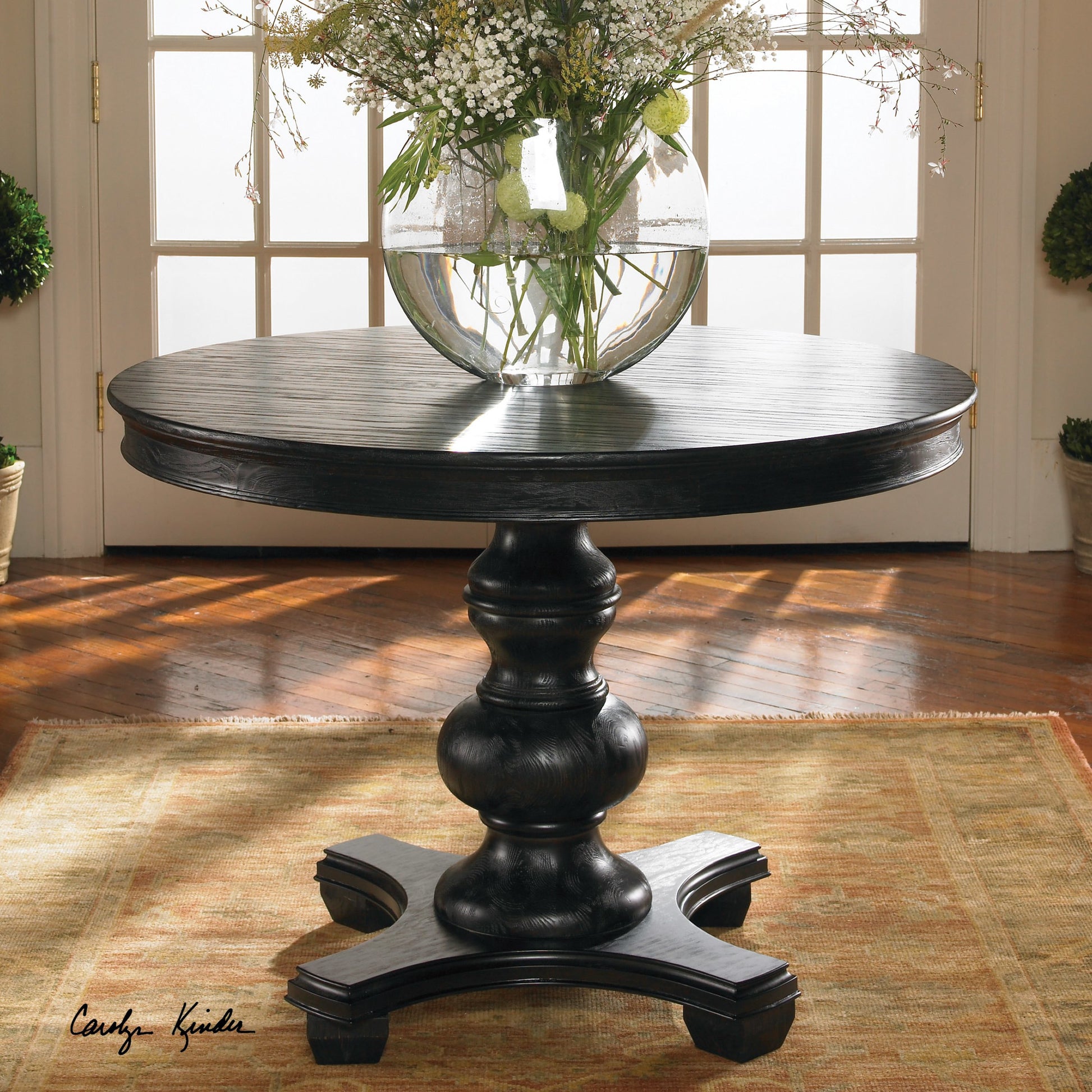 Brynmore Round Table by Uttermost. Made from wood, mdf, pu leather in a cottage & farmhouse style.