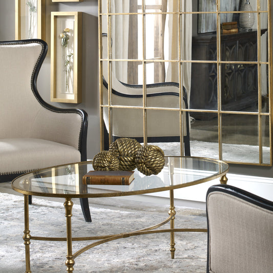 Vitya Glass Coffee Table by Uttermost. Made from metal, tempered glass in a modern style.