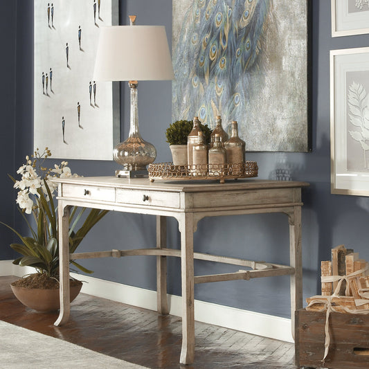 Bridgely Aged Writing Desk by Uttermost. Made from mango wood with carb mdf in a cottage & farmhouse style.