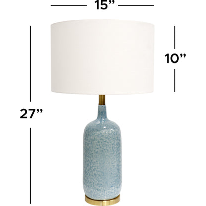 Tucson Table Lamp by Pasargad Home in gold and blue. Made from ceramic in a coastal style.