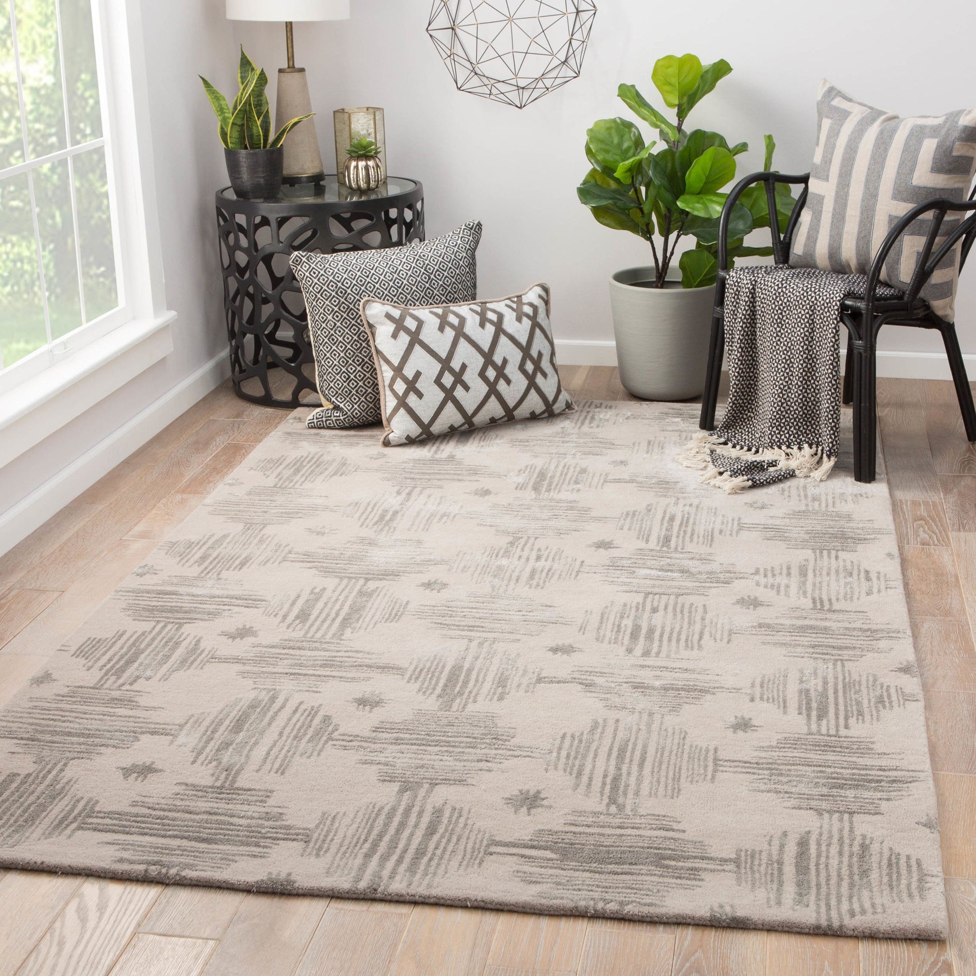 Banister Rug by Jaipur Living in gray, gold. Made from 77% wool 23% viscose in a unique style.