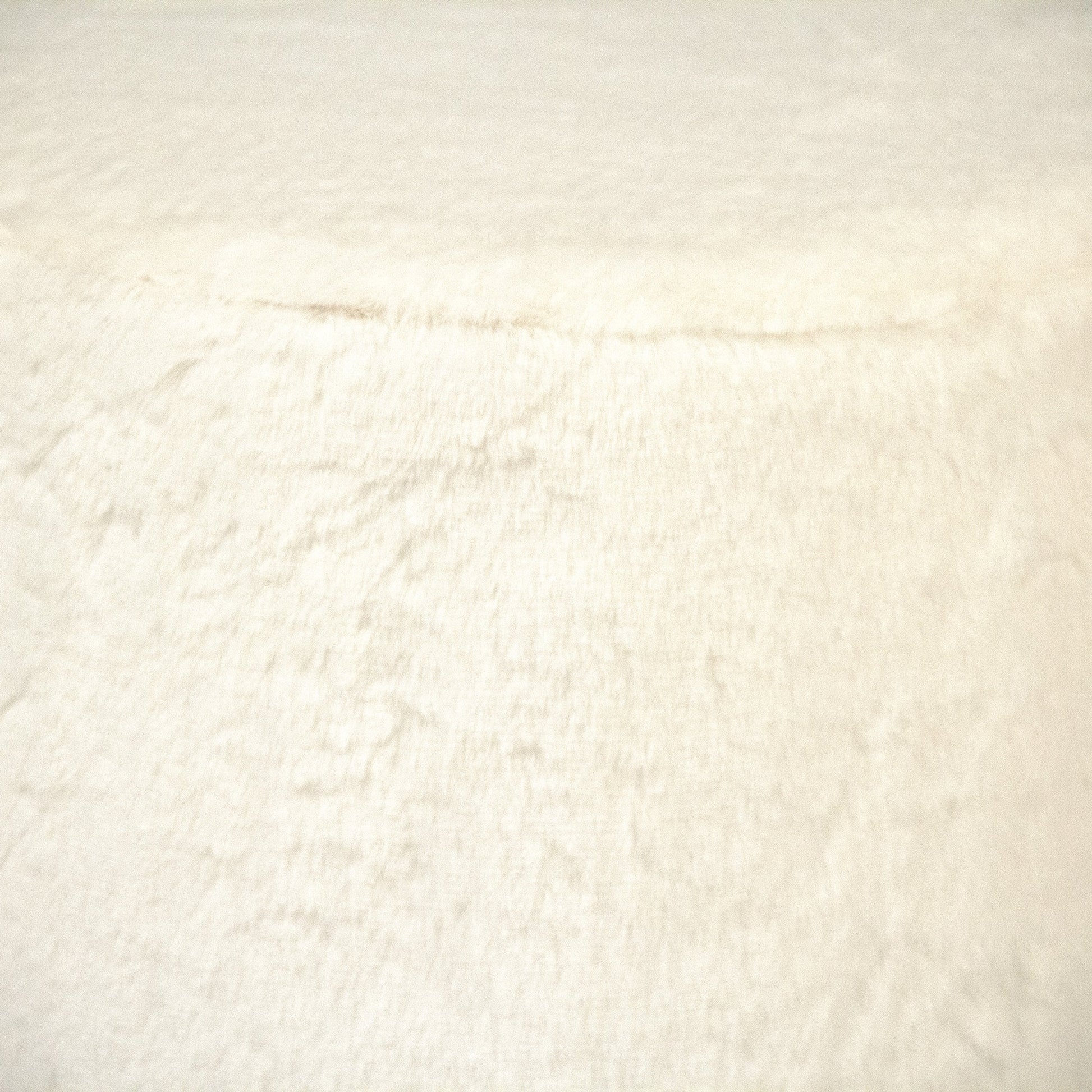 White Faux Fur Vanity Stool by Zentique in white. Made from white faux fur velvet in a transitional style.