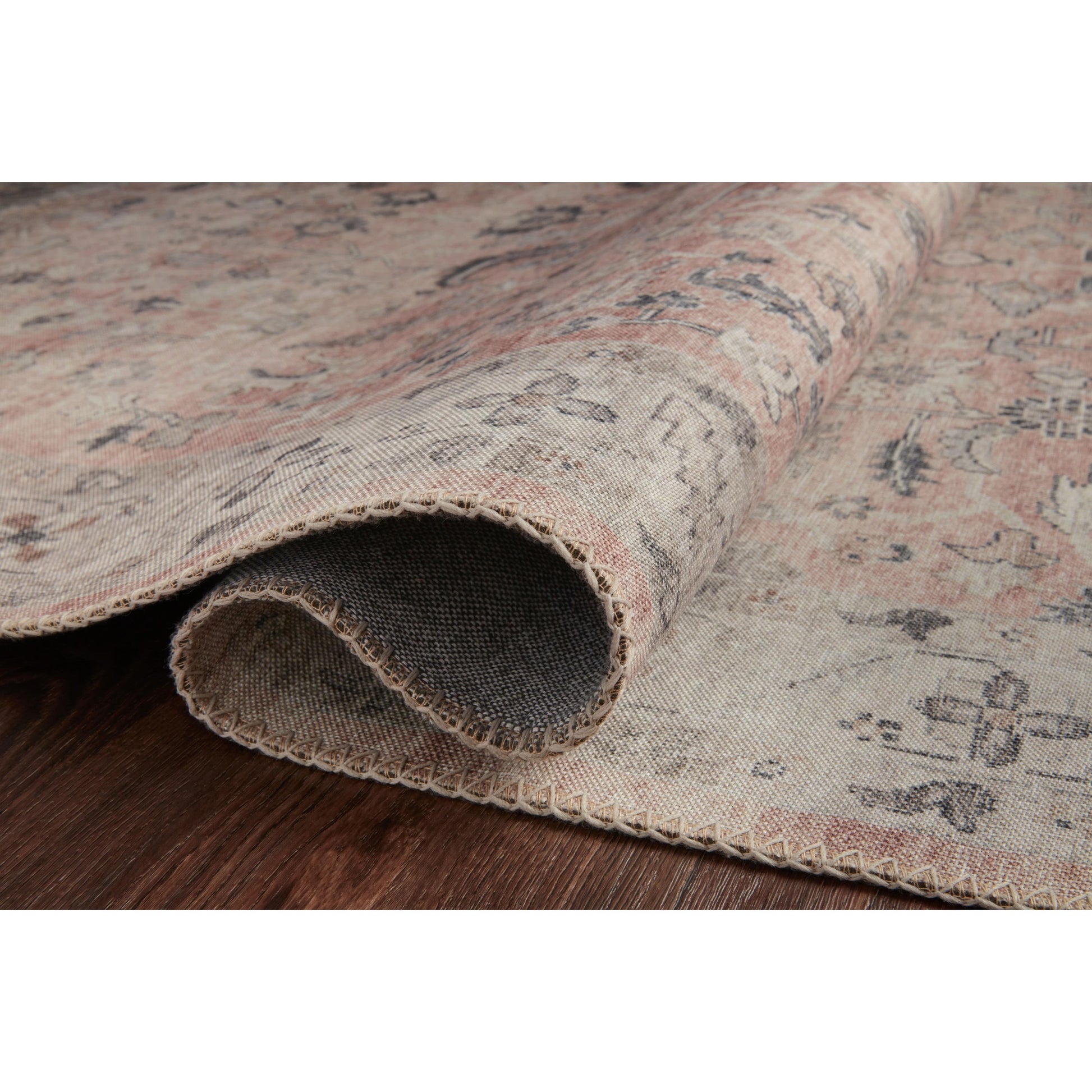 HTH-06 by Loloi in rust, multi. Made from 100% polyester in a traditional style.