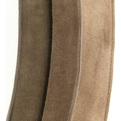 Pendre Mirror by Zentique in tan suede leather and suede, glass. Made from suede, glass in a rustic style.