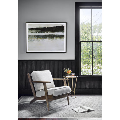 Creighton End Table by Four Hands in aged brass. Made from aluminum, tempered glass in a modern style.