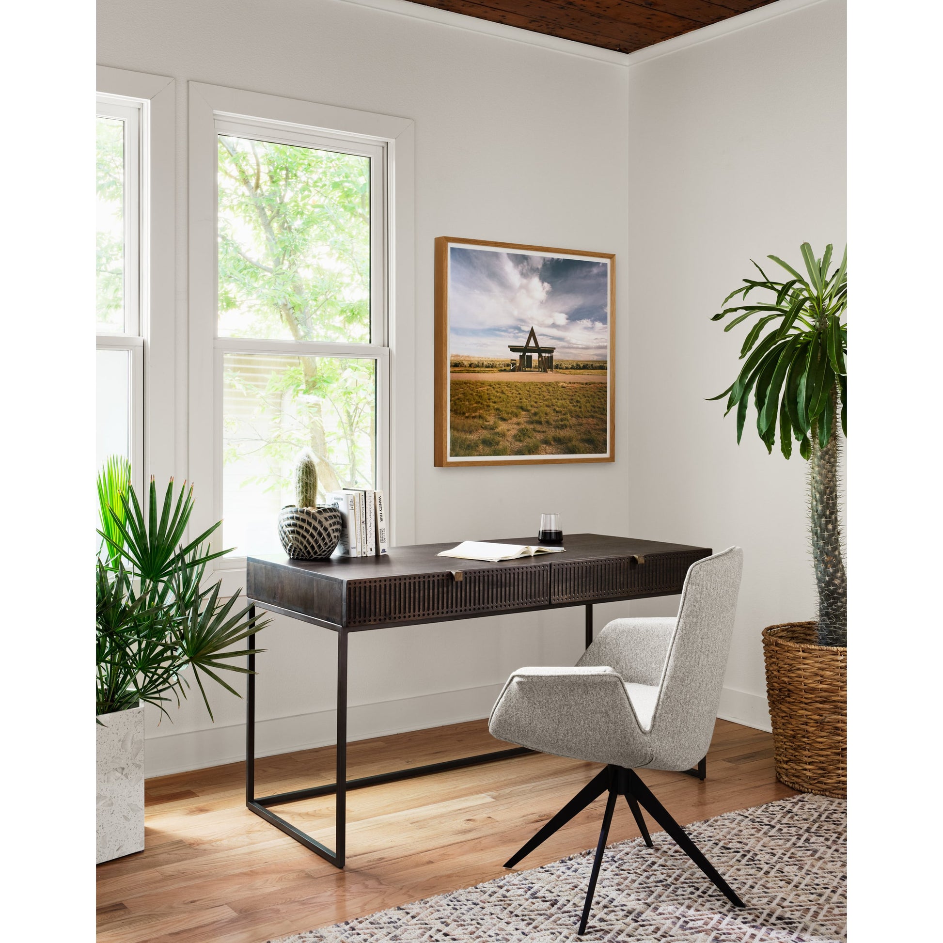 Kelby Writing Desk by Four Hands in aged brass, carved vintage brown, vintage brown, gunmetal and vintage brown. Made from solid mango, iron in a modern style.
