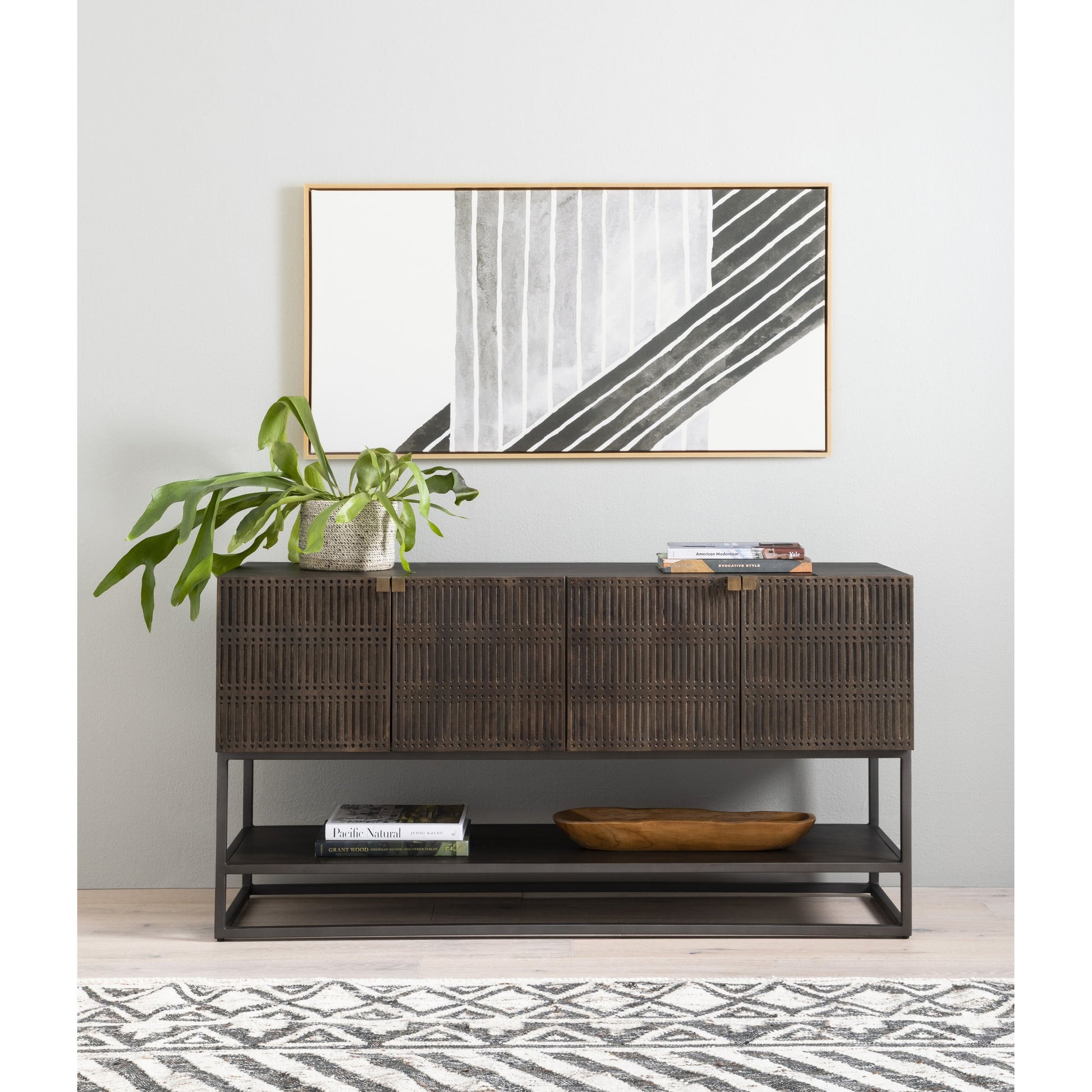 Kelby Small Media Cabinet by Four Hands in gunmetal, light wash mango, aged brass, light wash carved mango. Made from solid mango, iron in a modern style.
