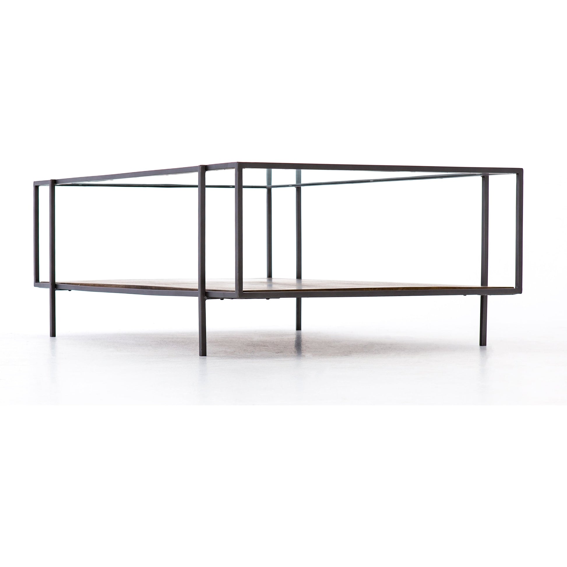 Byron Coffee Table by Four Hands in gunmetal, aged brown, tempered glass and dark iron, aged brown, tempered glass. Made from iron, solid mango, tempered glass in a modern style.