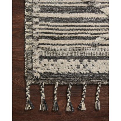 IMA-01 by Loloi in ivory, charcoal. Made from 100% wool in a rustic style.