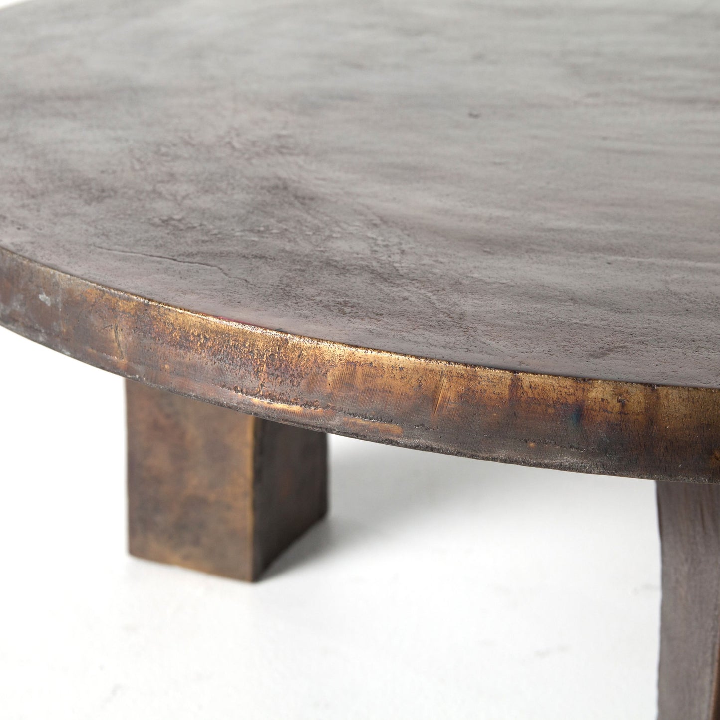 002 S-279262 | Closeup | Cruz Coffee Table by Four Hands in antique rust. Made from aluminum in a eclectic & global style.