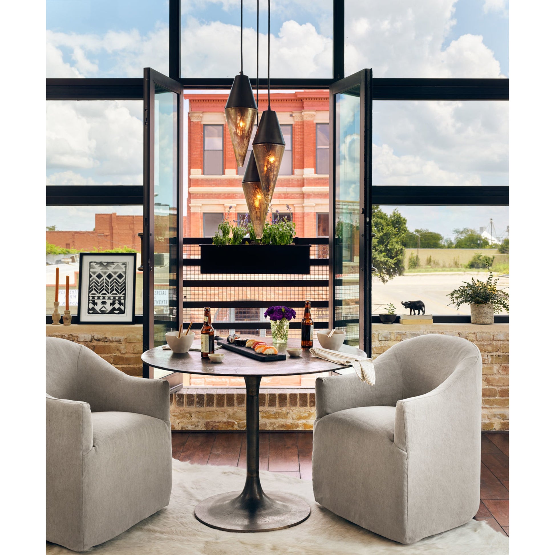 Simone Bistro Table by Four Hands. Made from aluminum in a modern style.