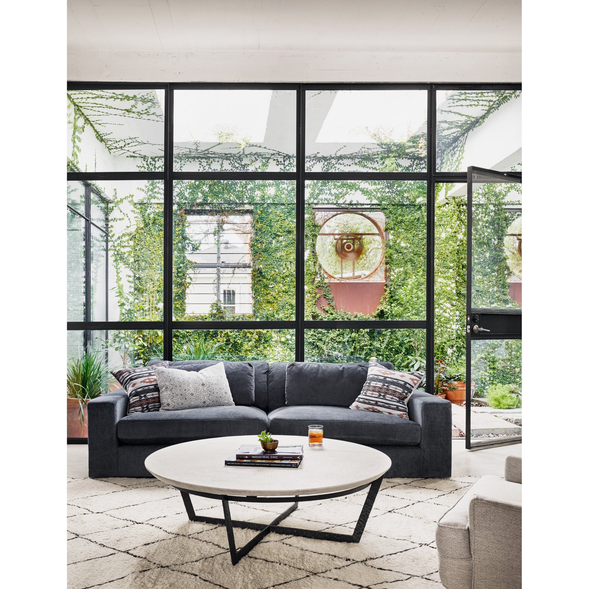 Felix Round Coffee Table by Four Hands. Made from unique in a modern style.