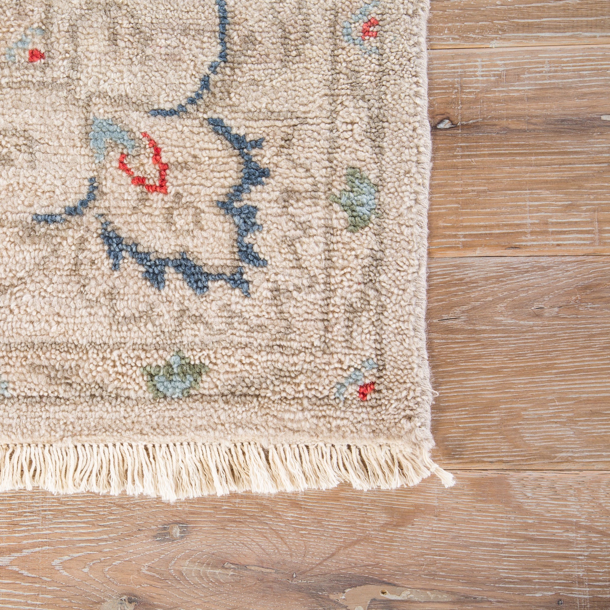 Hacci Rug by Jaipur Living in cream, blue. Made from 100% wool in a unique style.