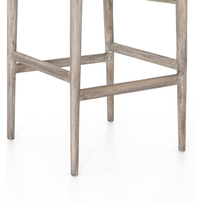 Muestra Bar Stool by Four Hands in vintage white, natural teak. Made from solid teak, 100% polyethylene in a coastal style.