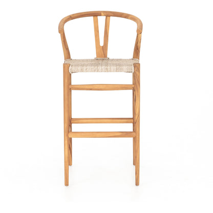 Muestra Bar Stool by Four Hands in vintage white, natural teak. Made from solid teak, 100% polyethylene in a coastal style.