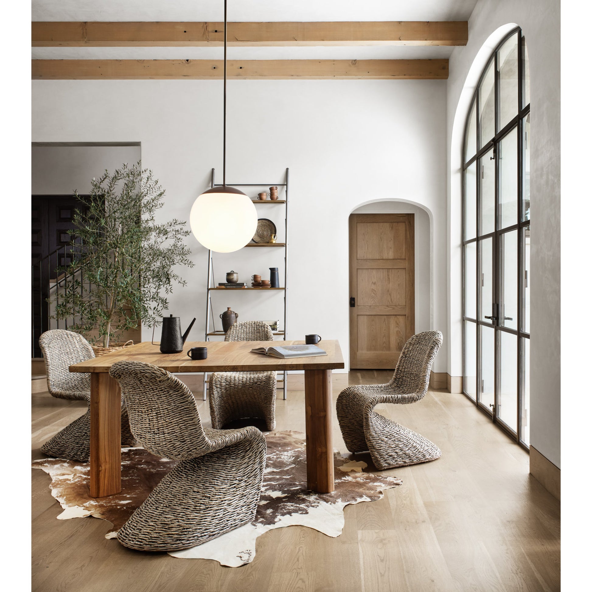 Portia Dining Chair by Four Hands in gray wash. Made from banana leaf, iron in a modern style.