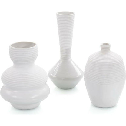 White Chiseled Vases by John-Richard in white. Made from glass in a modern style.