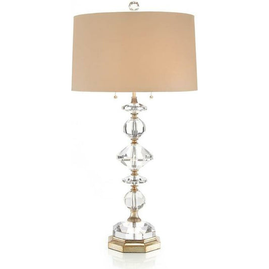 Diamond Table Lamp by John-Richard in champagne. Made from glass in a transitional style.