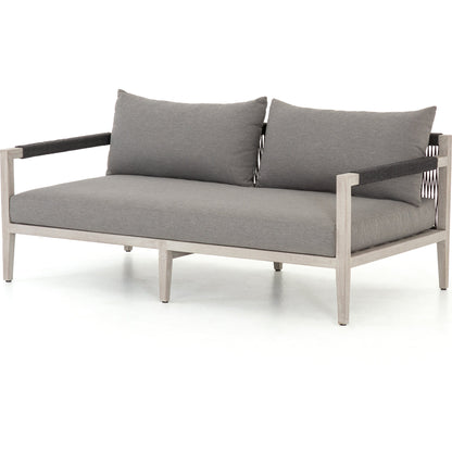 Sherwood Outdoor Sofa, Weathered Grey by Four Hands. Made from 100% olefin, solid fsc®-certified teak, 100% polypropylene in a coastal style.