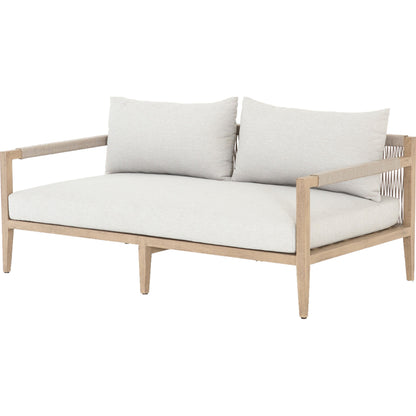 Sherwood Outdoor Sofa, Washed Brown by Four Hands. Made from 100% olefin, solid fsc®-certified teak, 100% polypropylene in a coastal style.