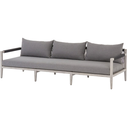 Sherwood Outdoor Sofa, Weathered Grey by Four Hands. Made from 100% olefin, solid fsc®-certified teak, 100% polypropylene in a coastal style.