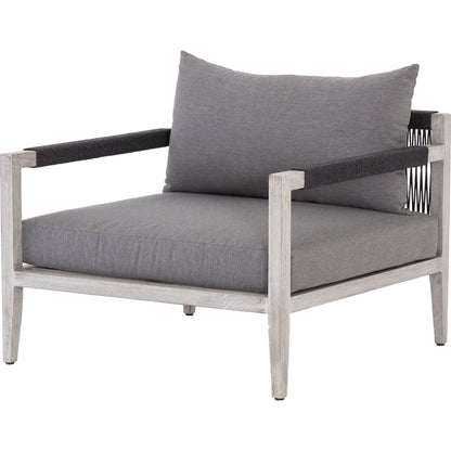 Sherwood Outdoor Chair, Weathered Grey by Four Hands. Made from 100% olefin, solid fsc®-certified teak, 100% polypropylene in a coastal style.