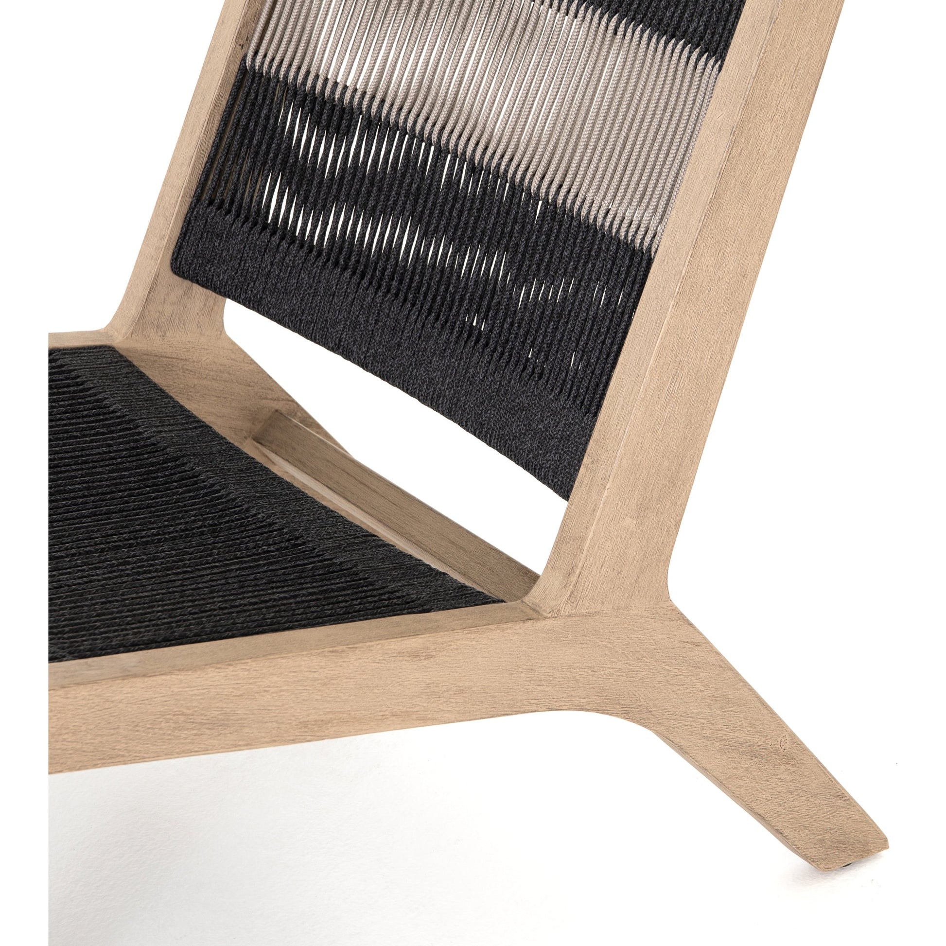 Julian Outdoor Chair by Four Hands. Made from 100% olefin, solid fsc®-certified teak, 100% polypropylene in a modern style.