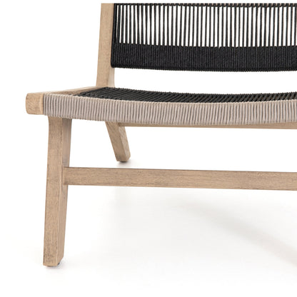 Julian Outdoor Chair by Four Hands. Made from 100% olefin, solid fsc®-certified teak, 100% polypropylene in a modern style.