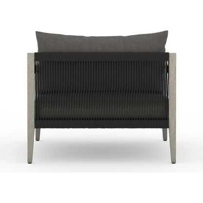 Sherwood Outdoor Chair, Weathered Grey by Four Hands. Made from 100% olefin, solid fsc®-certified teak, 100% polypropylene in a coastal style.