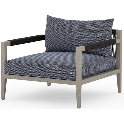 Sherwood Outdoor Chair, Weathered Grey by Four Hands. Made from 100% olefin, solid fsc®-certified teak, 100% polypropylene in a coastal style.