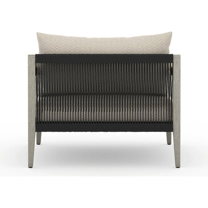 Sherwood Outdoor Chair, Weathered Grey by Four Hands. Made from 100% olefin, solid fsc®-certified teak, 100% polypropylene in a coastal style.