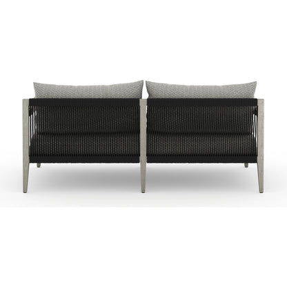 Sherwood Outdoor Sofa, Weathered Grey by Four Hands. Made from 100% olefin, solid fsc®-certified teak, 100% polypropylene in a coastal style.
