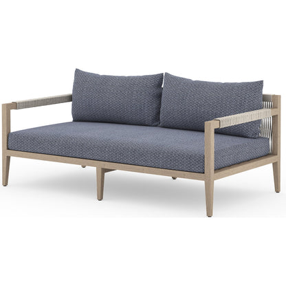 Sherwood Outdoor Sofa, Washed Brown by Four Hands. Made from 100% olefin, solid fsc®-certified teak, 100% polypropylene in a coastal style.