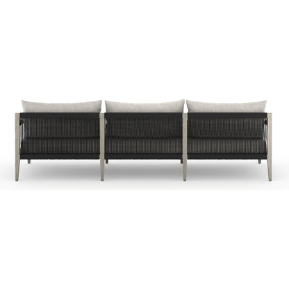 Sherwood Outdoor Sofa, Weathered Grey by Four Hands. Made from 100% olefin, solid fsc®-certified teak, 100% polypropylene in a coastal style.