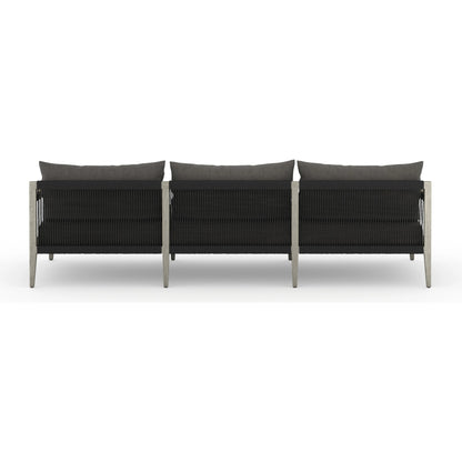 Sherwood Outdoor Sofa, Weathered Grey by Four Hands. Made from 100% olefin, solid fsc®-certified teak, 100% polypropylene in a coastal style.