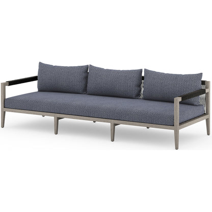Sherwood Outdoor Sofa, Weathered Grey by Four Hands. Made from 100% olefin, solid fsc®-certified teak, 100% polypropylene in a coastal style.