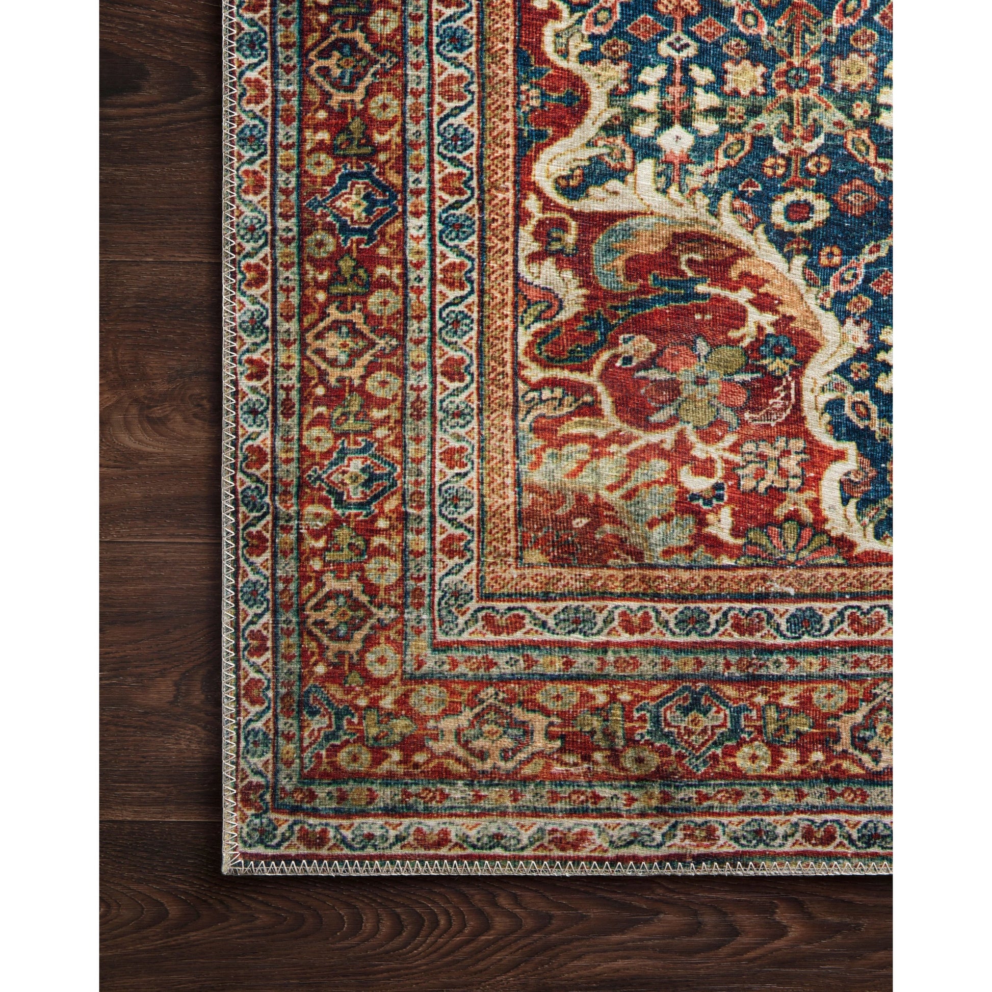 Layla LAY-09 Rug by Loloi in cobalt blue, spice. Made from 100% polyester in a traditional style.