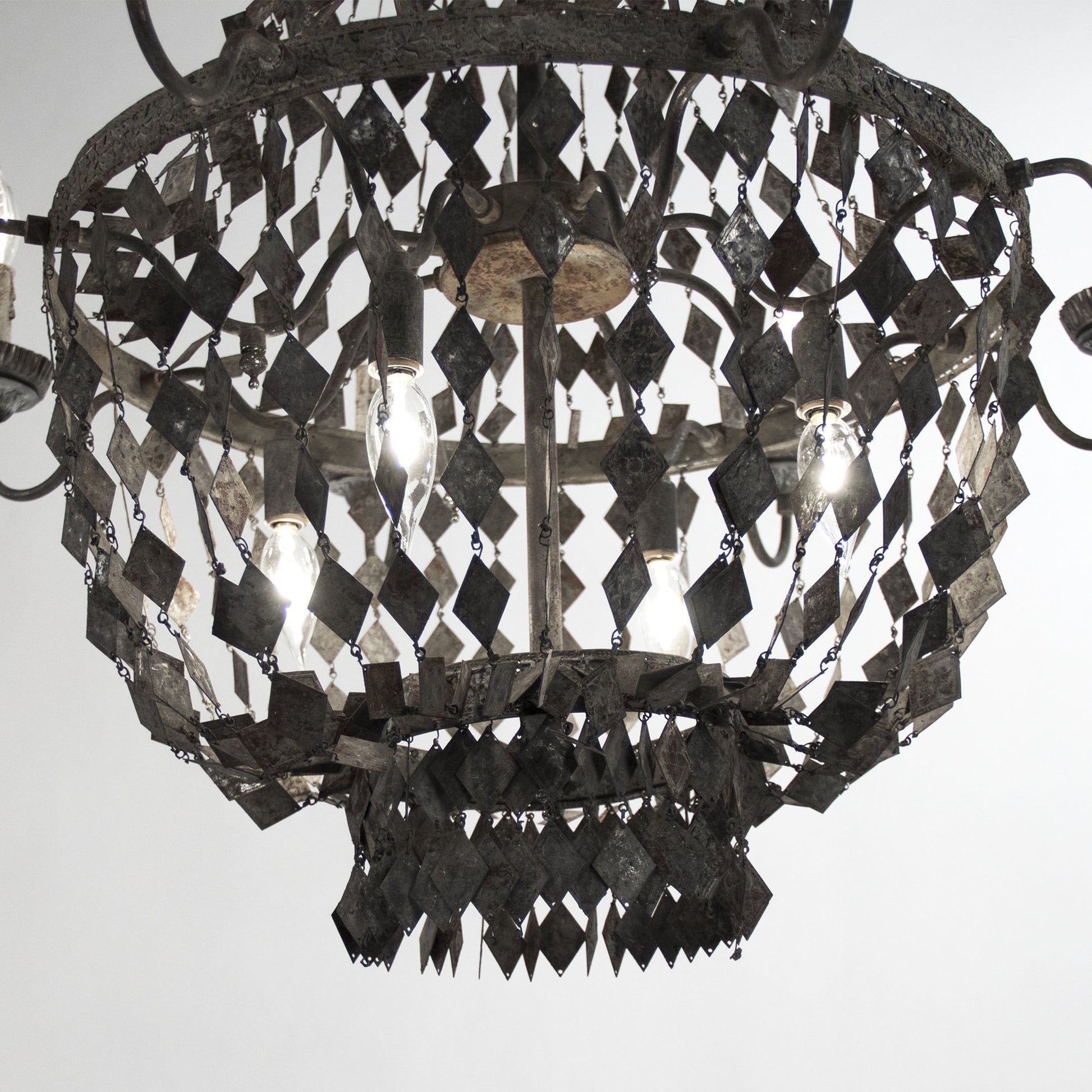 Nicia Chandelier by Zentique in rustic dark gray and iron. Made from iron in a transitional style.
