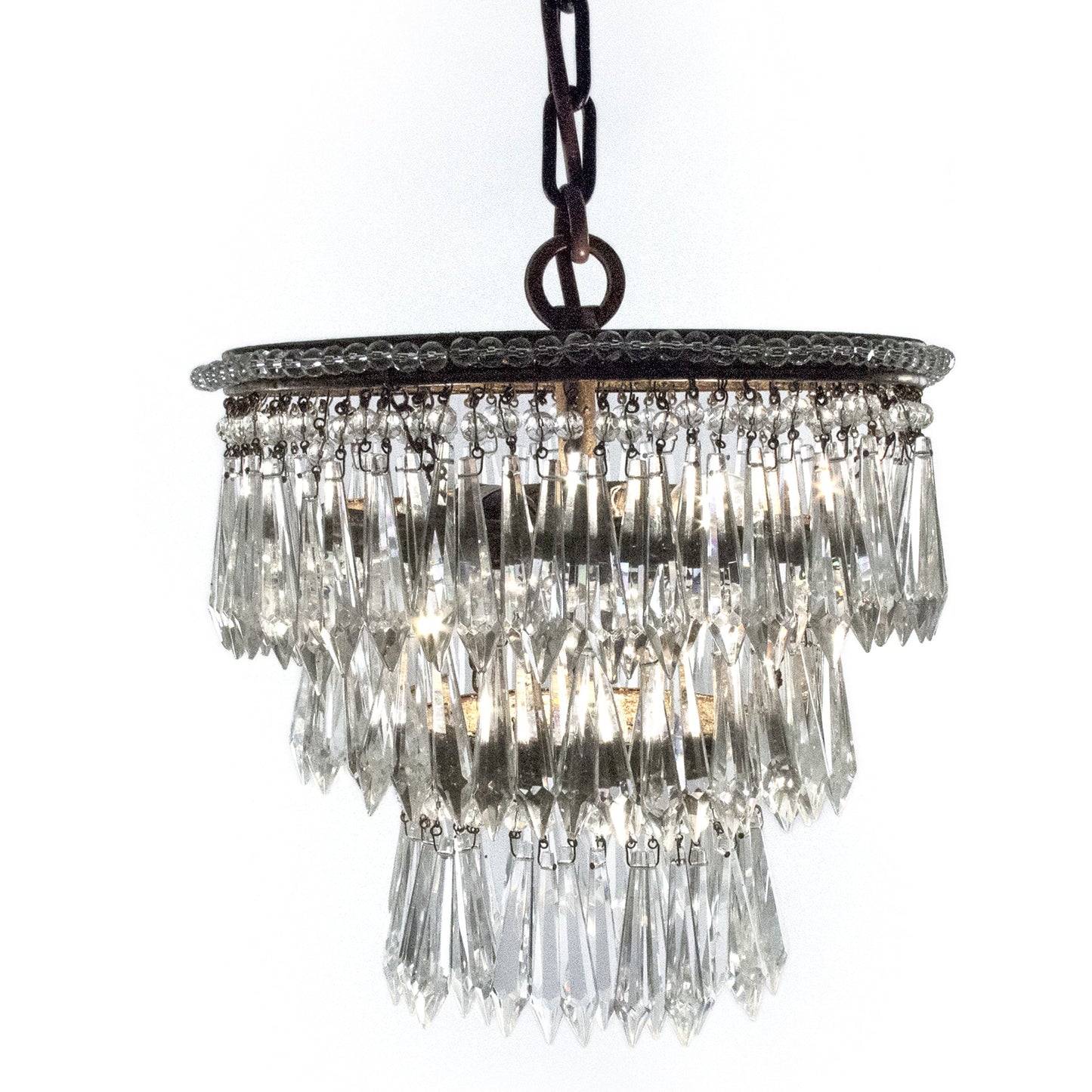 003 S-336559 | Closeup | Ancil Chandelier by Zentique in copper hardware and crystal, copper. Made from crystal, copper in a traditional style.